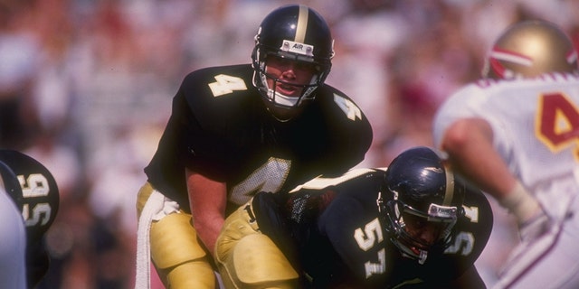 Quarterback Brett Favre, of the Southern Mississippi Golden Eagles, calls the snap count from under center during the Golden Eagles 30-26 victory over the Florida State Seminoles at Roberts Stadium in Hattiesburg, Mississippi. 