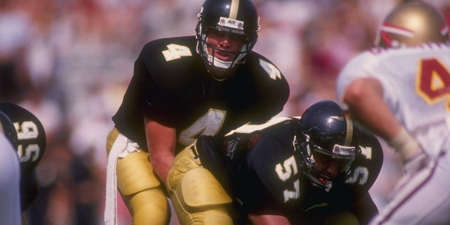 Quarterback Brett Favre, of the Southern Mississippi Golden Eagles, calls the snap count from under center during the Golden Eagles 30-26 victory over the Florida State Seminoles at Roberts Stadium in Hattiesburg, Mississippi.