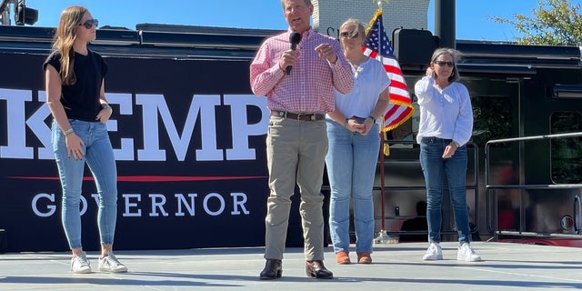 Gov. Brian Kemp speaks at a re-election rally on Sept. 27, 2022, in Alpharetta, Georgia 
