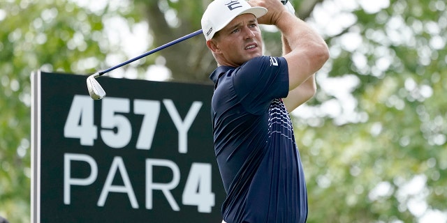 Bryson DeChambeau watches his tee shot on the fourth hole during the final round of the LIV Golf Invitational-Chicago tournament Sunday, Sept. 18, 2022, in Sugar Hill, Ill.
