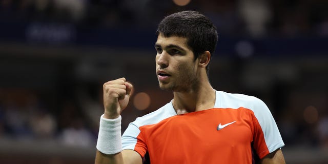 Carlos Alcaraz of Spain celebrates a point against Casper Ruud of Norway during their Men's Singles Final match on Day Fourteen of the 2022 US Open at USTA Billie Jean King National Tennis Center on September 11, 2022 in the Flushing neighborhood of the Queens borough of New York City.