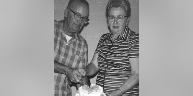 Montgomery County Special Deputy Sheriff Captain James Tappen Hall in family photo with cake.