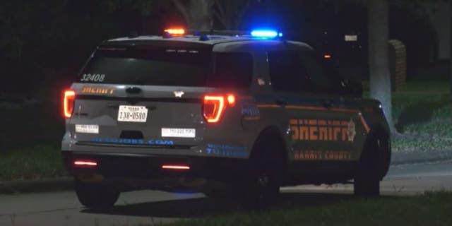 A Harris County Sheriff's Office patrol vehicle outside the scene of a teenage rented house party shooting.