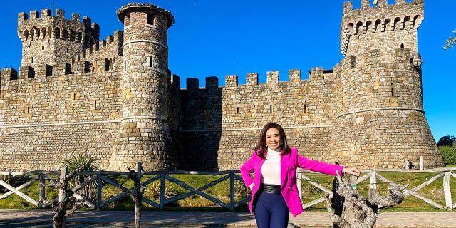Judge Jeanine Pirro stands in front of Castello di Amorosa in Napa Valley.