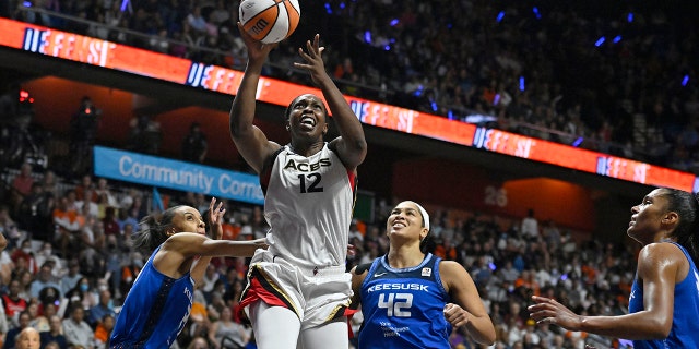 Chelsea Gray (12) of the Las Vegas Aces goes up for a basket against the Connecticut Sun in Game 4 of the WNBA Finals in Uncasville, Connecticut on September 29, 2019. 18, 2022.