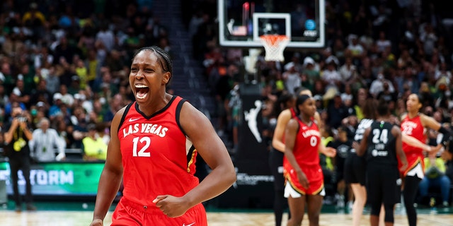 Las Vegas Aces guard Chelsea Gray, #12, reacts at the end of the team's win over the Seattle Storm in Game 4 of a WNBA basketball playoff semifinal Tuesday, Sept. 6, 2022, in Seattle.