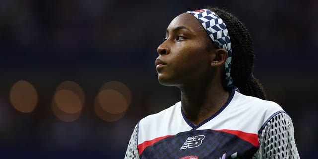 Coco Gauff of the United States watches Caroline Garcia of France during their women's singles quarterfinal match on day nine of the 2022 US Open at the USTA Billie Jean King National Tennis Center on September 6, 2022 in the Flushing neighborhood of Borough of Queens City of York. 