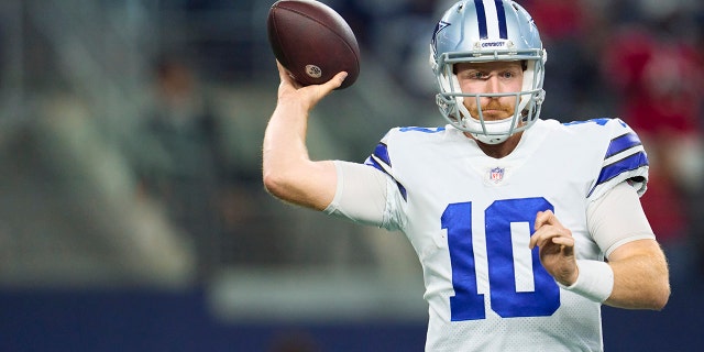 Cooper Rush, #10 of the Dallas Cowboys, drops back to pass against the Tampa Bay Buccaneers at AT&T Stadium on Sept. 11, 2022 in Arlington, Texas.