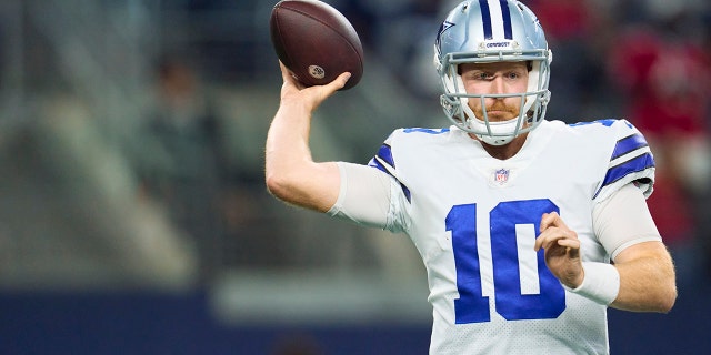 Cooper Rush, #10 of the Dallas Cowboys, drops back to pass against the Tampa Bay Buccaneers at AT&amp;T Stadium on Sept. 11, 2022 in Arlington, Texas. 