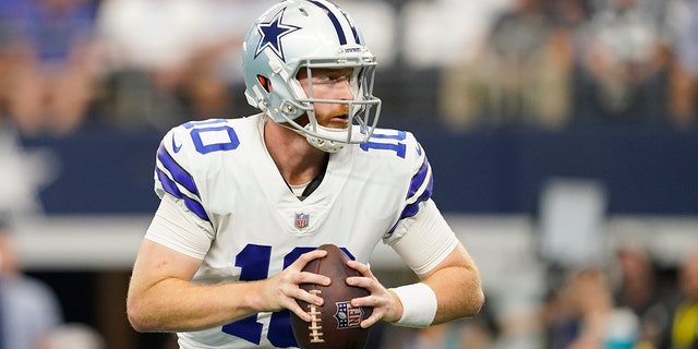 Dallas Cowboys quarterback Cooper Rush looks to pass during the first half against the Cincinnati Bengals in Arlington, Texas, on Sept. 18, 2022.