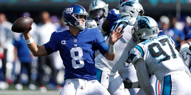 New York Giants quarterback Daniel Jones throws during the first half of an NFL football game against the Carolina Panthers, Sunday, Sept.  18, 2022, in East Rutherford, NJ