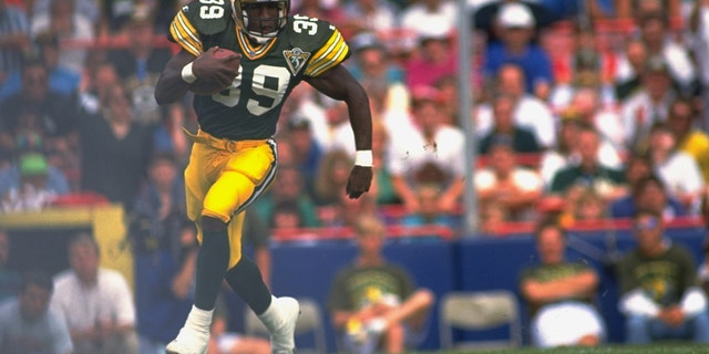 Green Bay Packers' Darrell Thompson in action alone against the Los Angeles Rams.