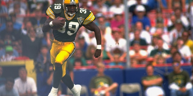 Green Bay Packers' Darrell Thompson in action alone against the Los Angeles Rams.