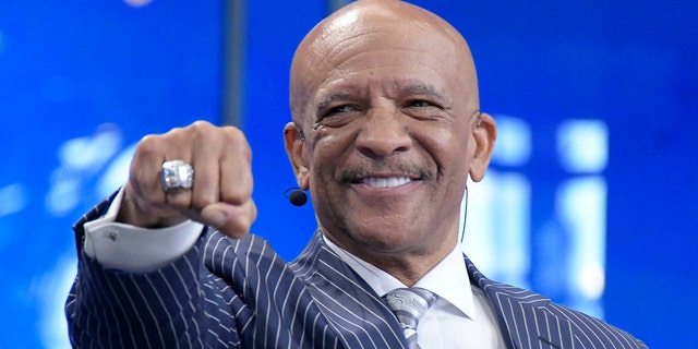 Former Dallas Cowboys wide receiver Drew Pearson shows off his Super Bowl ring during the NFL Draft at AT&amp;T Stadium in Arlington, Texas, on Thursday, April 26, 2018. 