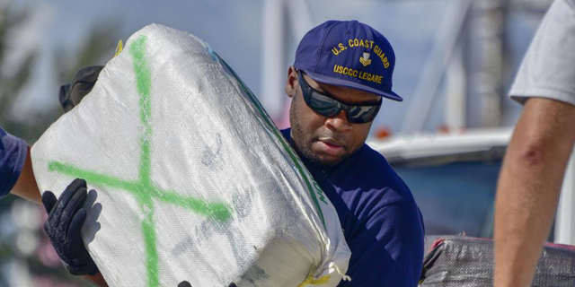 The crews intercepted drugs in the neutral waters of the Caribbean and the Eastern Pacific.