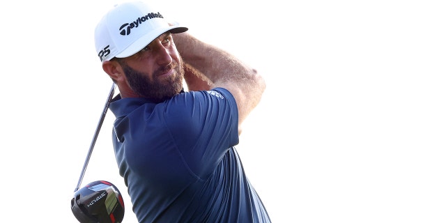 Dustin Johnson of 4 Aces GC plays his shot from the 18th tee during Day Three of the LIV Golf Invitational - Chicago at Rich Harvest Farms on Sept. 18, 2022 in Sugar Grove, Illinois.