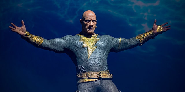 Actor Dwayne "The Rock" Johnson appears at the Warner Brothers panel promoting his upcoming film "Black Adam" at 2022 Comic-Con International Day 3 at San Diego Convention Center on July 23, 2022 in San Diego.