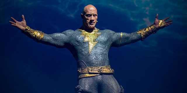 Actor Dwayne "The Rock" Johnson appears at the Warner Brothers panel promoting his upcoming film "Black Adam" at 2022 Comic-Con International Day 3 at San Diego Convention Center on July 23, 2022 in San Diego.