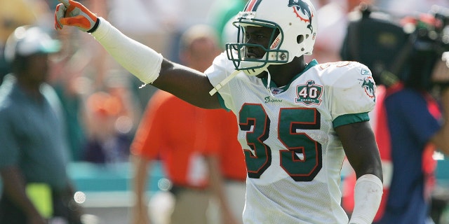 Cornerback Eddie Jackson of the Miami Dolphins celebrates after the Dolphins defeated the Carolina Panthers at Dolphins Stadium in Miami, Fla., on Sept. 25, 2005.