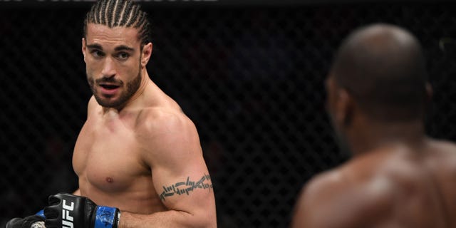 Elias Theodorou of Canada battles Derek Brunson in their middleweight bout during the UFC Fight Night event at Canadian Tire Centre on May 4, 2019 in Ottawa, Ontario, Canada.