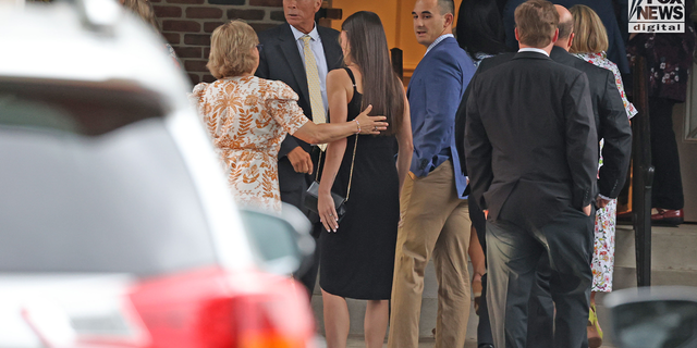 Eliza Fletcher's father, James Beasley Wellford, and mourners gather at the Second Presbyterian Church in Memphis, Tennessee, on September 10, 2022, for the funeral service for Eliza Fletcher.