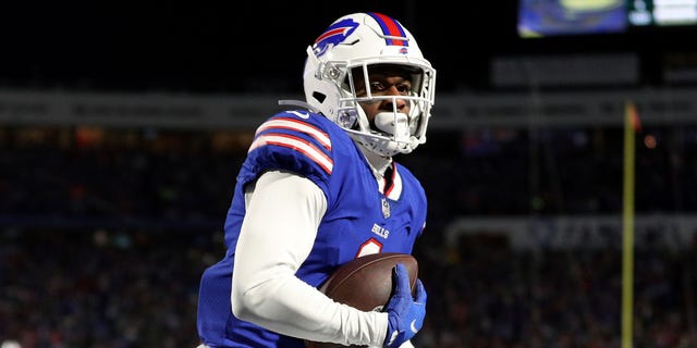 Emmanuel Sanders of the Buffalo Bills scores a touchdown against the New England Patriots during the third quarter of an AFC Wild Card playoff game at Highmark Stadium in Orchard Park, New York, on January 15, 2022.
