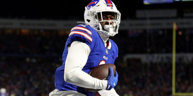 Emmanuel Sanders of the Buffalo Bills scores a touchdown against the New England Patriots during the third quarter of an AFC Wild Card playoff game at Highmark Stadium in Orchard Park, New York, on January 15, 2022.