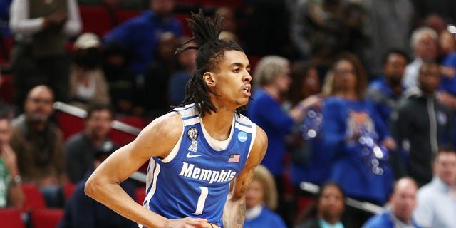 Emoni Bates #1 of the Memphis Tigers handles the ball during the first half against the Boise State Broncos in the first round game of the 2022 NCAA Men's Basketball Tournament at Moda Center on March 17, 2022 in Portland, Oregon.