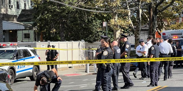 New York City police at a crime scene in the Astoria neighborhood of Queens where FDNY paramedic Lt. Alison Russo-Elling was fatally stabbed on Thursday.