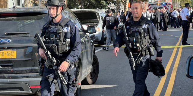 New York City tactical police arrive on scene in Queens to apprehend the suspect in the fatal stabbing of FDNY paramedic Lt. Alison Russo-Elling.