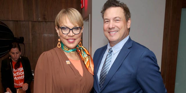 Claire Babineaux-Fontenot (left) and Rocco DiSpirito are shown on Friday, Sept. 23, 2022, as Feeding America, along with City Harvest and Food Bank for New York City, hosted a Hunger Action Day event at Urban Outreach Center in New York City.