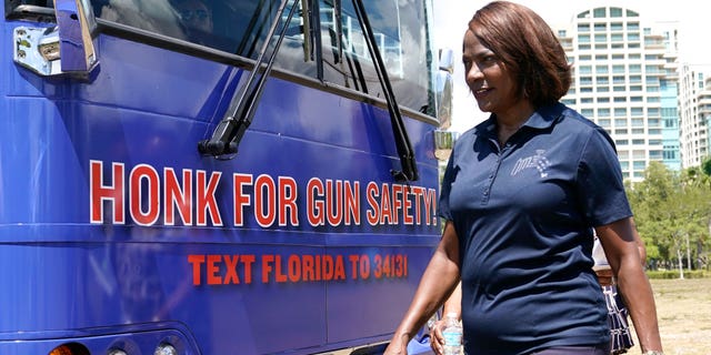 Rep. Val Demings, D-Fla., walks next to a bus at the kick off of the Giffords Florida bus tour, Thursday, Sept. 8, 2022, in Miami. Giffords Florida was launched by Giffords, the national gun violence prevention organization led by former Rep. Gabrielle Giffords of Arizona, in support of Florida candidates to end gun violence. Democrats in Florida are trying to make inroads firing up Latino voters on gun safety. Demings is running against Republican Senator Marco Rubio in the midterm elections. (AP Photo/Lynne Sladky)