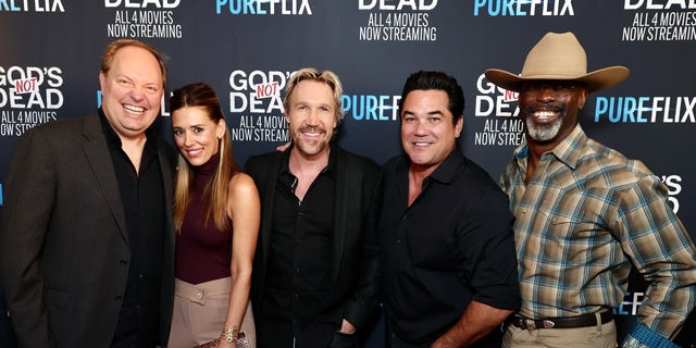 Production on a fifth installment of the andquot;God's Not Deadandquot; franchise is set for later this year. Pictured: Pure Flix founding partner Michael Scott, actress Cory Oliver, actor and Pure Flix founding partner David A.R. White, actor Dean Cain and Washington.