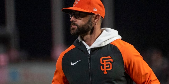 San Francisco Giants manager Gabe Kapler, #19, looks on during the sixth inning against the San Diego Padres at Oracle Park in San Francisco on August 30, 2022.