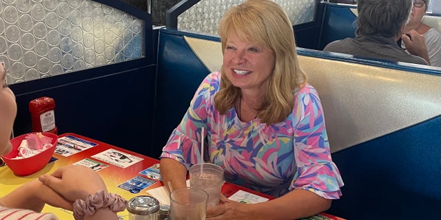 Republican U.S. House candidate Gail Huff Brown, who's running in New Hampshire's 1st Congressional District, speaks with voters at MaryAnn's Diner in Derry on Sept. 12, 2022.