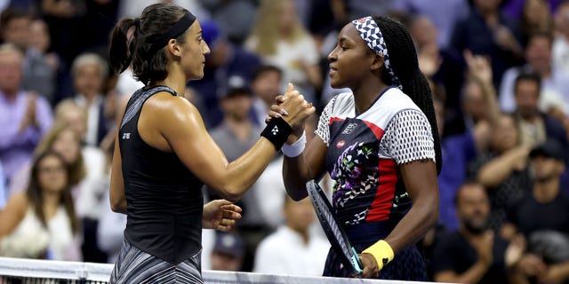 Caroline Garcia of France after the Women's Singles Quarterfinal match on Day 9 of the 2022 US Open held at the USTA Billie Jean King National Tennis Center in the Flushing neighborhood of Queens, New York City on September 6, 2022 , hugging Coco Gauff of the United States.  .