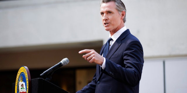 California Governor Gavin Newsom speaks before signing legislation establishing the Community Assistance, Recovery and Empowerment Act, in San Jose, Calif., Wednesday, Sept. 14, 2022.