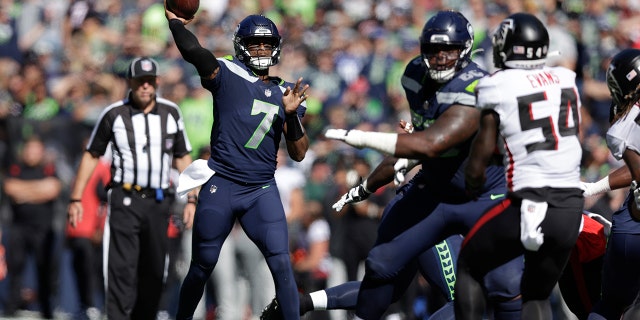 Seattle Seahawks quarterback Geno Smith throws a pass during the first half of an NFL football game against the Atlanta Falcons Sunday, Sept. 25, 2022, in Seattle.