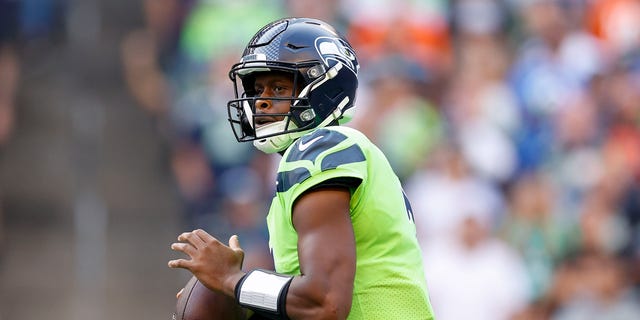 Geno Smith #7 of the Seattle Seahawks makes his return during the first quarter against the Denver Broncos at Lumen Field in Seattle, Washington on Sept. 12, 2022.