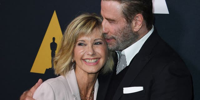The Australian-born performer maintained a very close relationship with John Travolta after their original hit film.