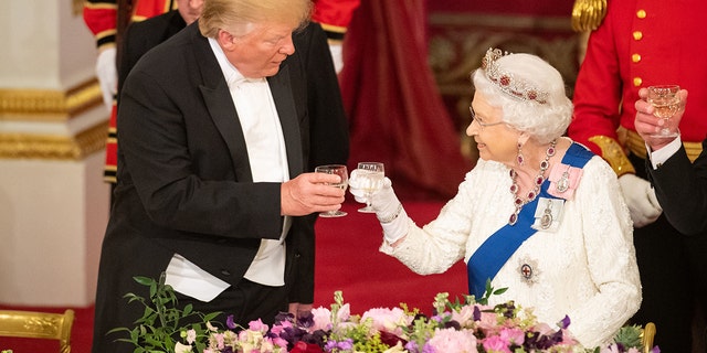 President Donald Trump and Queen Elizabeth II make a toast during a state banquet at Buckingham Palace on June 3, 2019, in London,