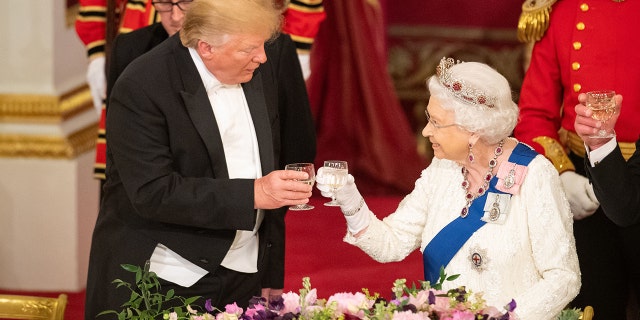 President Donald Trump and Queen Elizabeth II make a toast during a state banquet at Buckingham Palace on June 3, 2019, in London,