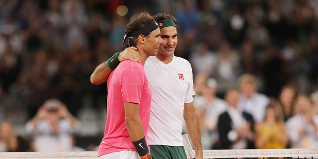 Roger Federer, right, of Switzerland, and Rafael Nadal of Spain during a match at Cape Town Stadium as part of an exhibition to support the education of African children Feb. 8, 2020, in Cape Town, South Africa. 