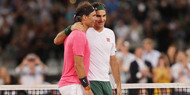 Roger Federer, right, of Switzerland, and Rafael Nadal of Spain during a match at Cape Town Stadium as part of an exhibition to support the education of African children Feb. 8, 2020, in Cape Town, South Africa.
