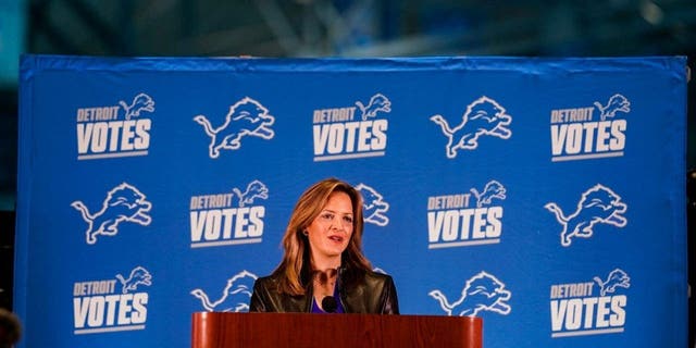 Michigan Secretary of State Jocelyn Benson speaks at a press conference while election workers prepare to secure ballots at Ford Field on Election Day, Tuesday, Nov. 3, 2020 in Detroit, MI.