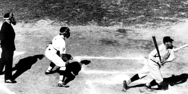 Babe Ruth, at the plate for the New York Yankees, swings at a pitch during a 1927 World Series game against the Pittsburgh Pirates in October 1927 at Forbes Field in Pittsburgh.