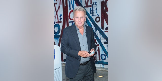 Pat Sajak was ripped on social media after a photo he took with Marjorie Taylor Greene went viral on Twitter.