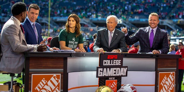 ESPN College Gameday staff Desmond Howard, Rece Davis, Lee Corso and Kirk Herbstreit along with celebrity guest picker former Indy Car and NASCAR driver Danica Patrick pick winners priori to a college football game between the Notre Dame Fighting Irish and the Wisconsin Badgers on September 25th, 2021 at Solider Field in Chicago, IL. 