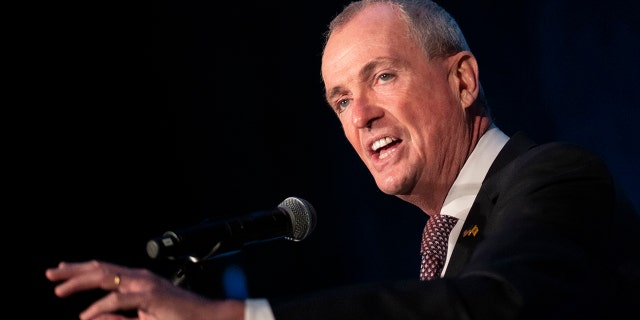 New Jersey Governor Phil Murphy gives a victory speech to supporters at the Grand Arcade at the Pavilion in Asbury Park, New Jersey, November 3, 2021. 