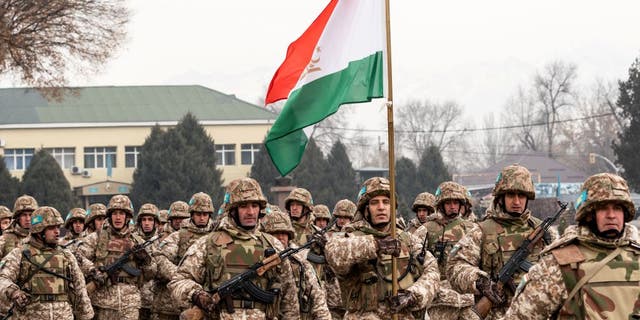 Tajikistan soldiers attend a ceremony marking the end of the CSTO mission in Almaty, on Jan. 13, 2022.
